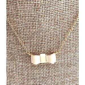 kate spade Gold Tone Bow Pendant Necklace with Cream Enamel